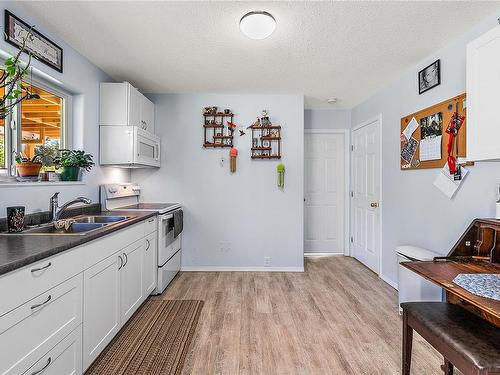 2113 Amethyst Way, Sooke, BC - Indoor Photo Showing Kitchen With Double Sink