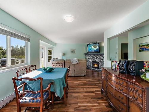 2113 Amethyst Way, Sooke, BC - Indoor Photo Showing Dining Room With Fireplace