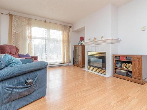 114-535 Manchester Rd, Victoria, BC - Indoor Photo Showing Living Room With Fireplace