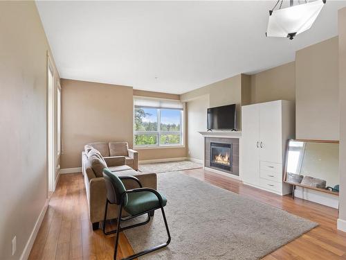 209-3220 Jacklin Rd, Langford, BC - Indoor Photo Showing Living Room With Fireplace