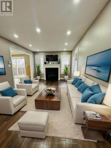 8596 Milomir Street, Niagara Falls, ON - Indoor Photo Showing Living Room With Fireplace