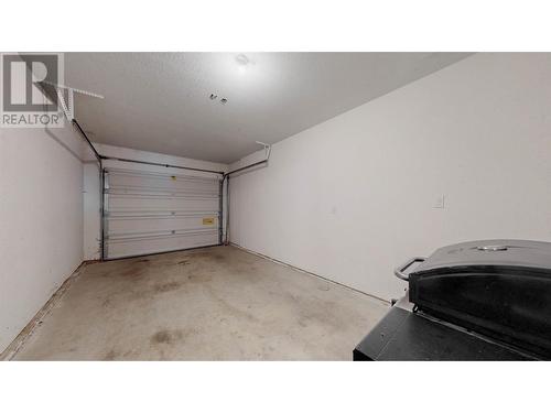 5401 Lakeshore Drive Unit# 113, Osoyoos, BC - Indoor Photo Showing Garage