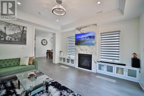 170 Wincott Drive W, Toronto, ON - Indoor Photo Showing Living Room With Fireplace