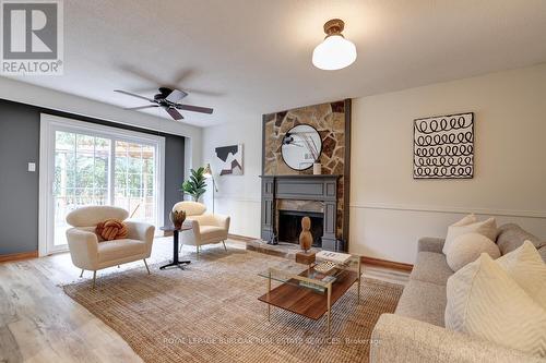 448 White Drive, Milton, ON - Indoor Photo Showing Living Room With Fireplace