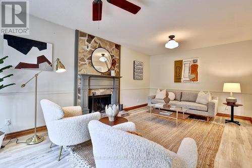 448 White Drive, Milton, ON - Indoor Photo Showing Living Room With Fireplace