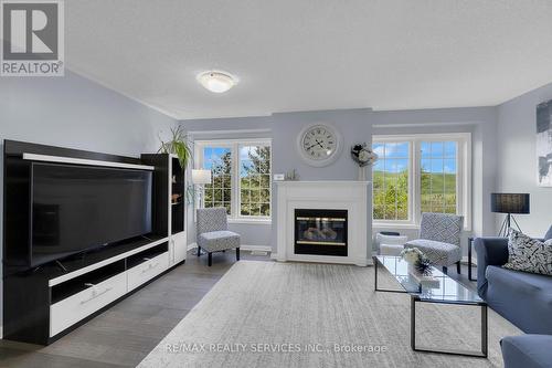 39 - 271 Richvale Drive S, Brampton, ON - Indoor Photo Showing Living Room With Fireplace