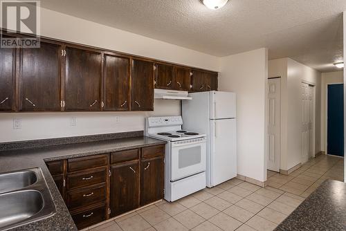 1645 Harper Drive, Prince George, BC - Indoor Photo Showing Kitchen With Double Sink