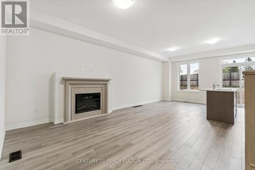 102 Turnberry Lane, Barrie, ON - Indoor Photo Showing Living Room With Fireplace