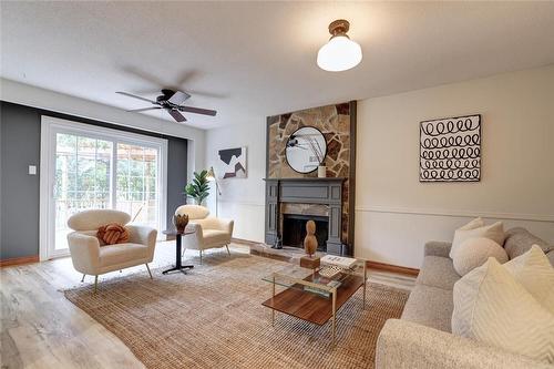 448 White Drive, Milton, ON - Indoor Photo Showing Living Room With Fireplace
