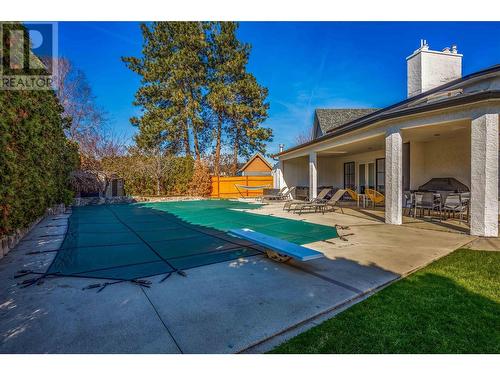 1720 Simpson Court, Kelowna, BC - Outdoor With In Ground Pool With Deck Patio Veranda