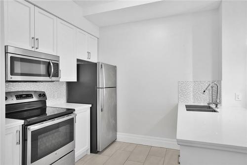 112 King Street E|Unit #1111, Hamilton, ON - Indoor Photo Showing Kitchen With Double Sink