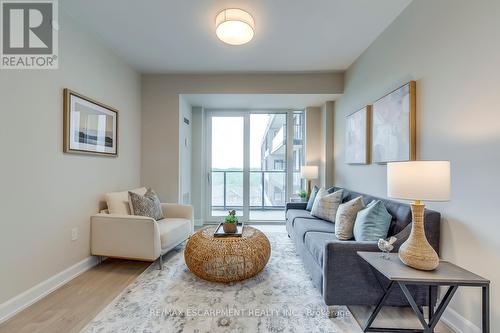 728 - 3200 William Coltson Avenue, Oakville, ON - Indoor Photo Showing Living Room