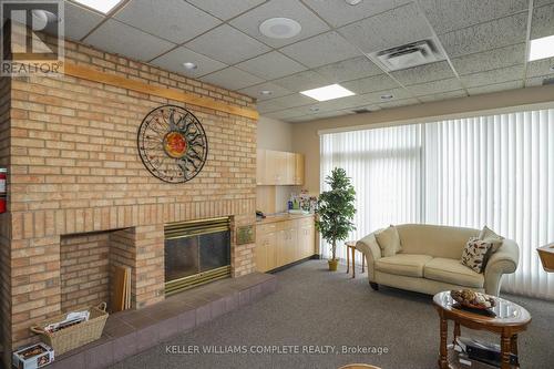 278 - 3033 Townline Road, Fort Erie, ON - Indoor Photo Showing Living Room With Fireplace
