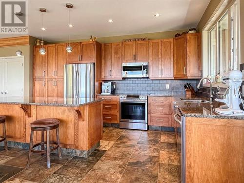 100 Maguire Place, Osoyoos, BC - Indoor Photo Showing Kitchen With Double Sink