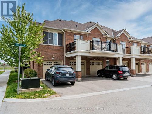303 - 276 Littlewood Drive, Oakville, ON - Outdoor With Facade