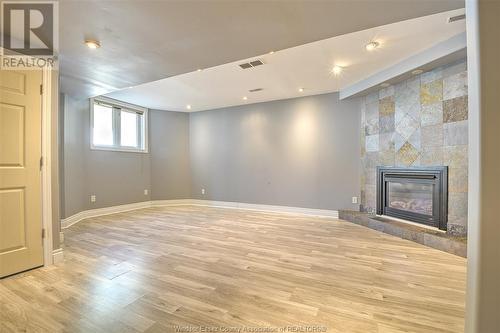 3566 Whiteside Drive, Windsor, ON - Indoor Photo Showing Other Room With Fireplace