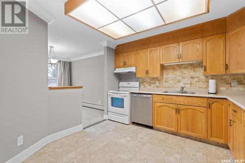 208 910 9Th Street E, Saskatoon, SK - Indoor Photo Showing Kitchen With Double Sink
