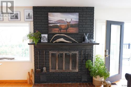 709 Foster St, Temiskaming Shores, ON - Indoor Photo Showing Living Room With Fireplace