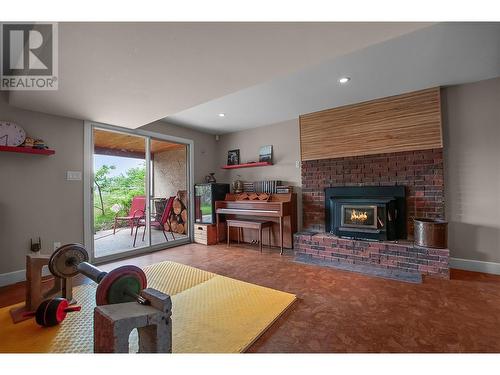 2645 Naramata Road, Naramata, BC - Indoor Photo Showing Living Room With Fireplace