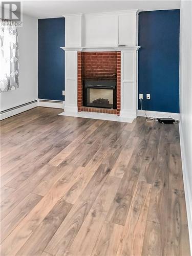 31 Anne Street, Moncton, NB - Indoor Photo Showing Living Room With Fireplace