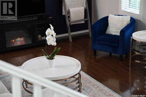 1645 3Rd Street, Estevan, SK - Indoor Photo Showing Living Room With Fireplace
