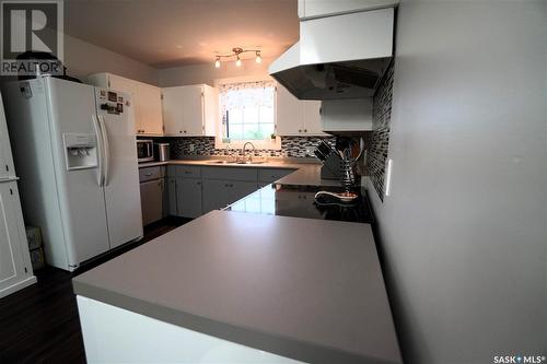 1645 3Rd Street, Estevan, SK - Indoor Photo Showing Kitchen With Double Sink