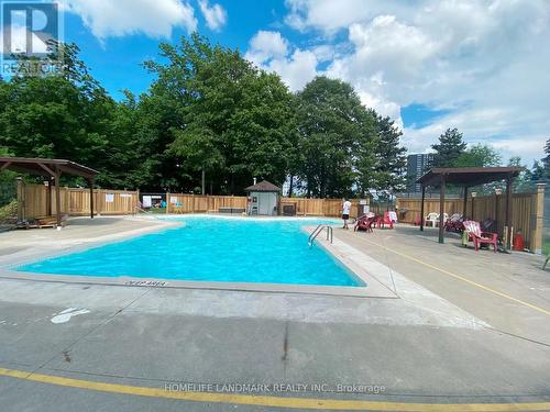 901 - 551 The West Mall, Toronto, ON - Outdoor With In Ground Pool With Backyard