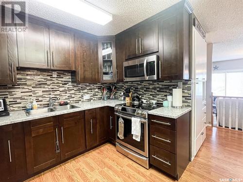 419 7Th Street W, Meadow Lake, SK - Indoor Photo Showing Kitchen With Double Sink With Upgraded Kitchen