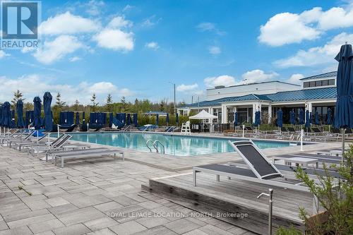 34 - 247 Broward Way, Innisfil, ON - Outdoor With In Ground Pool