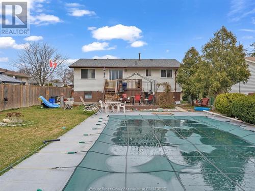9827 Ridge Road, Windsor, ON - Outdoor With In Ground Pool