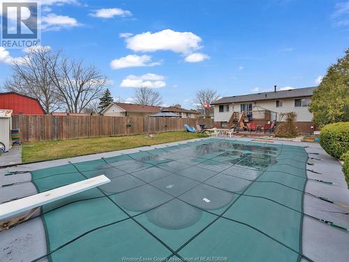 9827 Ridge Road, Windsor, ON - Outdoor With In Ground Pool With Backyard