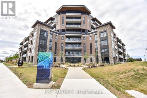 107 - 332 Gosling Gardens, Guelph, ON - Outdoor With Balcony With Facade