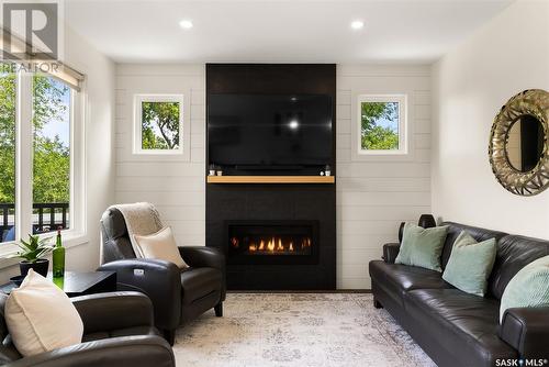 113 Green Avenue, Regina Beach, SK - Indoor Photo Showing Living Room With Fireplace