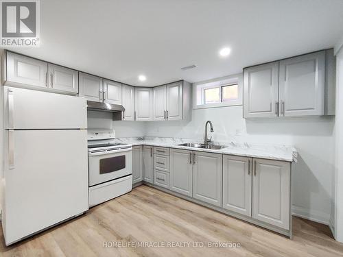 65 Loraine Drive, St. Catharines, ON - Indoor Photo Showing Kitchen With Double Sink