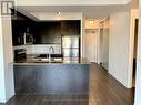 611 - 15 James Finlay Way, Toronto (Downsview-Roding-Cfb), ON  - Indoor Photo Showing Kitchen With Double Sink 