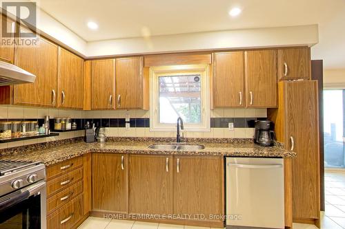 157 Cinrickbar Drive E, Toronto, ON - Indoor Photo Showing Kitchen With Double Sink