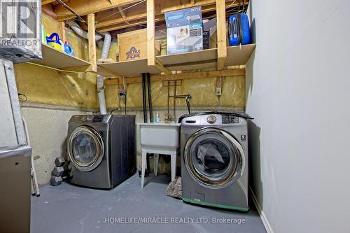 157 Cinrickbar Drive E, Toronto W10, ON - Indoor Photo Showing Laundry Room