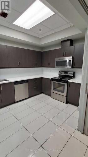410 - 80 Esther Lorrie Drive, Toronto W10, ON - Indoor Photo Showing Kitchen