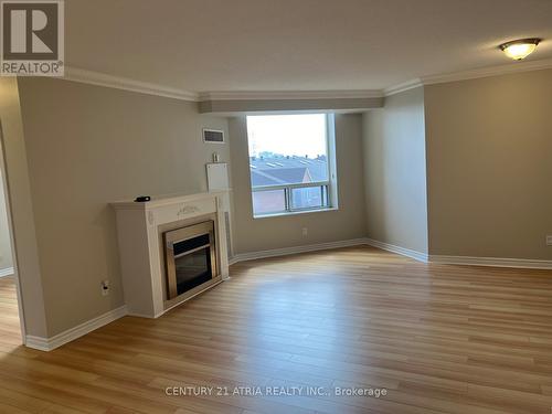 601 - 1883 Mcnicoll Avenue, Toronto E05, ON - Indoor With Fireplace