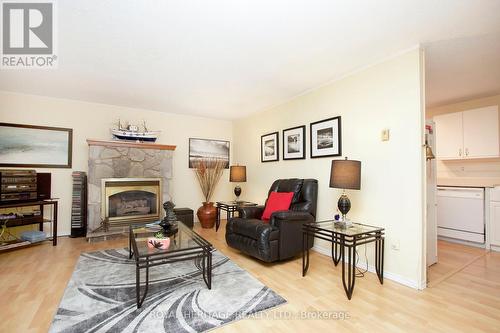 6 The Cove Road, Clarington, ON - Indoor Photo Showing Living Room With Fireplace