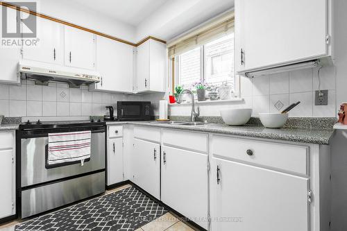 24 Evansville Road, Toronto, ON - Indoor Photo Showing Kitchen With Double Sink