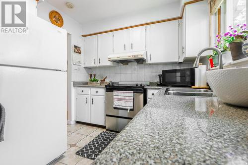 24 Evansville Road, Toronto, ON - Indoor Photo Showing Kitchen With Double Sink