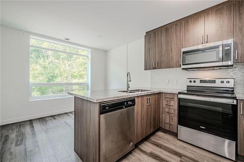 479 Charlton Avenue|Unit #202, Hamilton, ON - Indoor Photo Showing Kitchen With Double Sink