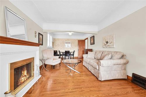 30 Cameron Avenue S, Hamilton, ON - Indoor Photo Showing Living Room With Fireplace