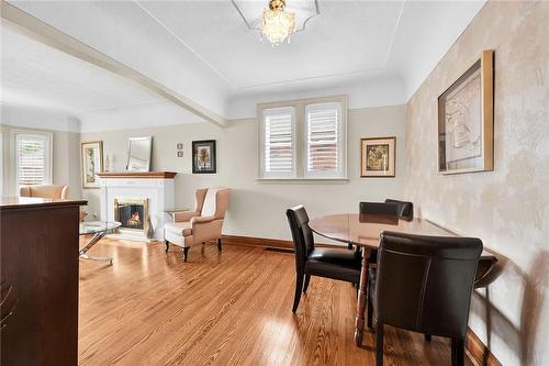 30 Cameron Avenue S, Hamilton, ON - Indoor Photo Showing Dining Room With Fireplace