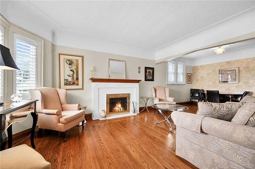 30 Cameron Avenue S, Hamilton, ON - Indoor Photo Showing Living Room With Fireplace