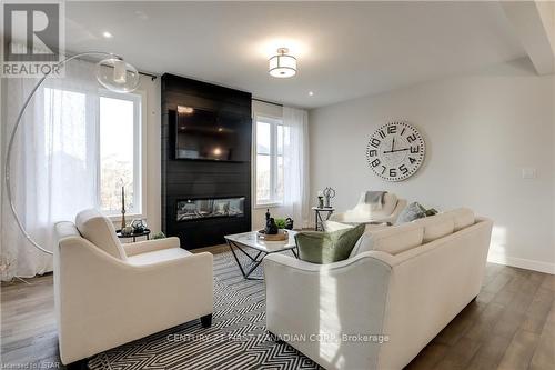 36 Rosina Lane, Zorra (Thamesford), ON - Indoor Photo Showing Living Room With Fireplace