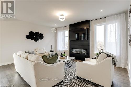 36 Rosina Lane, Zorra (Thamesford), ON - Indoor Photo Showing Living Room With Fireplace