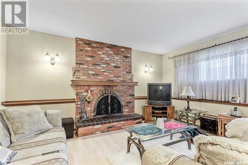 123 Plainsview Drive, Regina, SK - Indoor Photo Showing Living Room With Fireplace