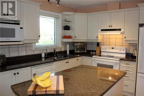 Kitchen with view of backyard - 95 Algonquin Avenue, Long Sault, ON - Indoor Photo Showing Kitchen With Double Sink